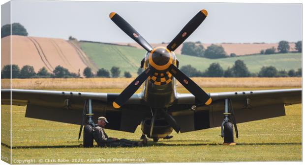 Mustang parked at Duxford air show Canvas Print by Chris Rabe
