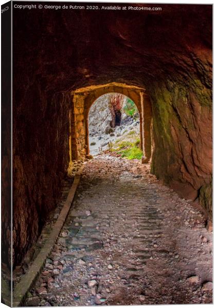 Light at the end of the old Sark Harbour tunnel ! Canvas Print by George de Putron