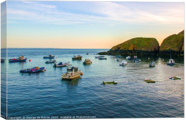 Boats moored outside Creux Harbour Sark  Canvas Print by George de Putron