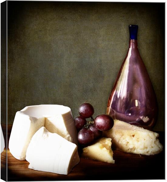 chiaroscuro still life: grapes and cheese Canvas Print by Luisa Vallon Fumi