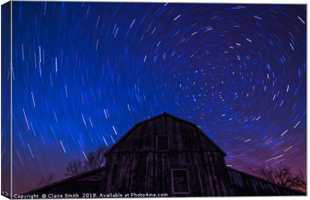 Brilliant star trails over old Ontario Barn Canvas Print by Claire Smith