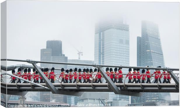 Marching across London Canvas Print by WATCHANDSHOOT 