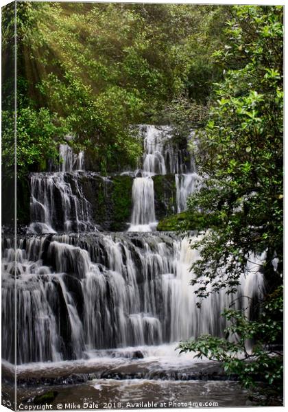 Sunshine on a beautiful waterfall Canvas Print by Mike Dale