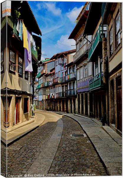 Street Scene Guimaraes, Portugal Canvas Print by Roz Collins