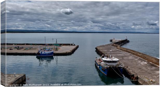 Tranquil Reflections at Burghead Harbour Canvas Print by Tom McPherson