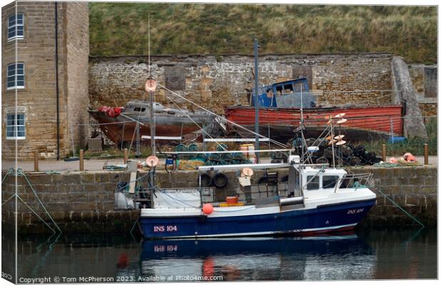 Ancient Meets Modern at Burghead Harbour Canvas Print by Tom McPherson