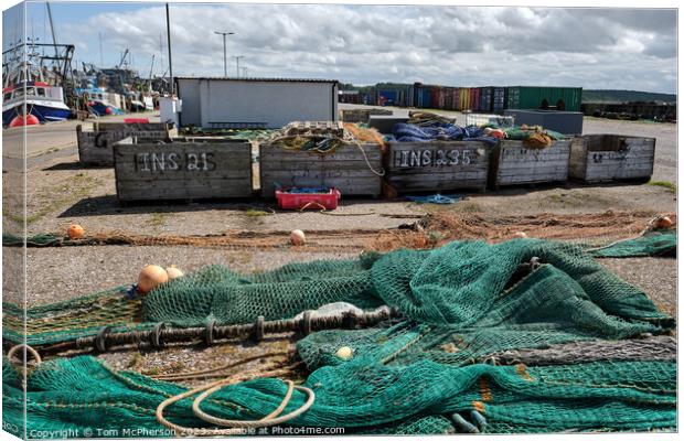 Burghead Harbour: A Bustling Beacon of Scotland Canvas Print by Tom McPherson
