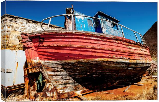 Red Wreck at Burghead Canvas Print by Tom McPherson