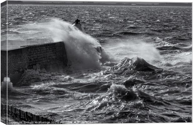 Burghead Pier takes a Battering Canvas Print by Tom McPherson