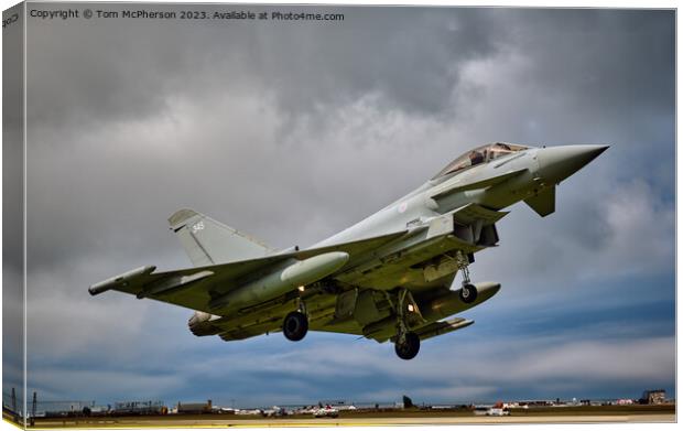 Typhoon FGR.Mk 4A fighter jet flying through the air on a cloudy day Canvas Print by Tom McPherson