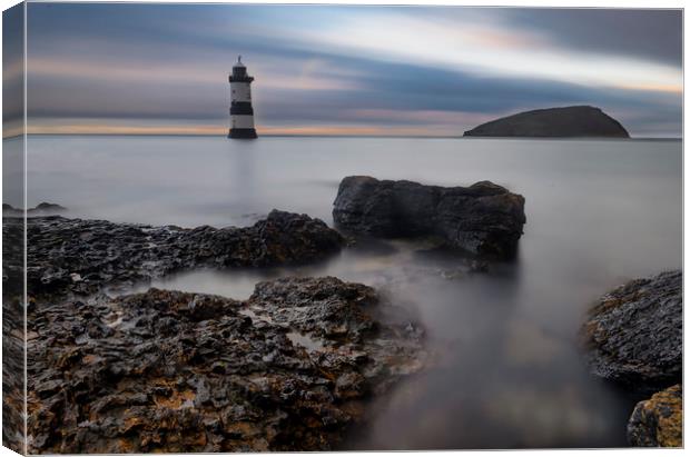 Penmon Lighthouse Canvas Print by Ray Tickle
