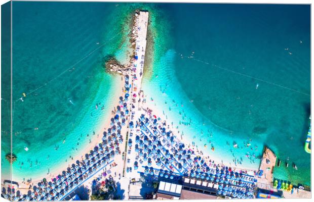 Aerial view of Poli Mora turquoise sand beach in Selce Canvas Print by Dalibor Brlek