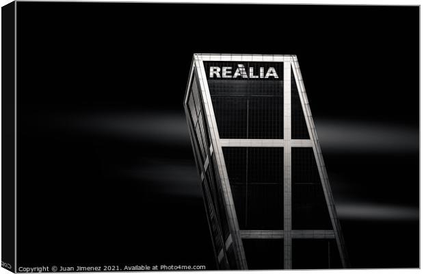 Realia skyscraper in Plaza de Castilla Square against sky Canvas Print by Juan Jimenez