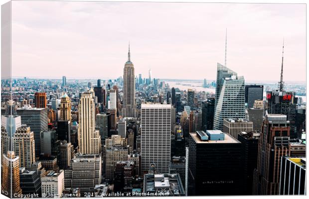 Skyline of New York City at Sunset Canvas Print by Juan Jimenez