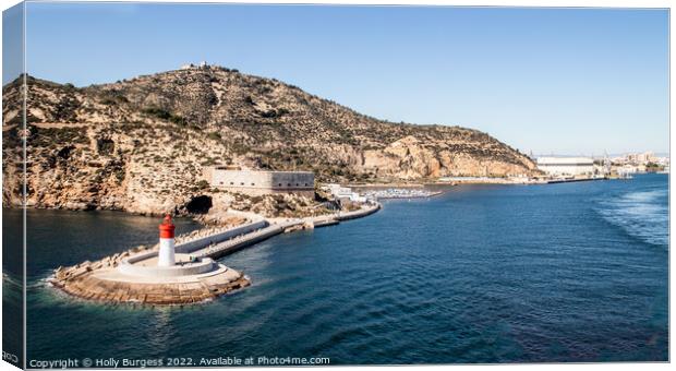 Cartagena port in Spain the Harbour with a red light house  Canvas Print by Holly Burgess