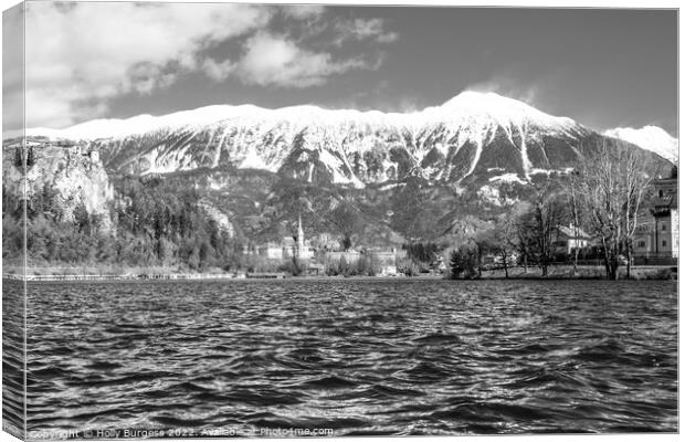 Bled Black and White of the snow cap Mountains in Slovenian Canvas Print by Holly Burgess