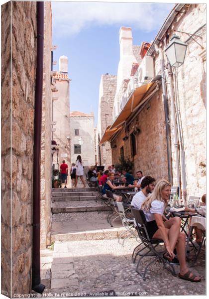 Enjoying life outside in Dubrovnik Croatia  Canvas Print by Holly Burgess