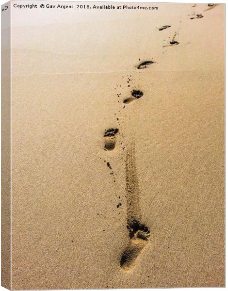 Footsteps in the sand Canvas Print by Gav Argent