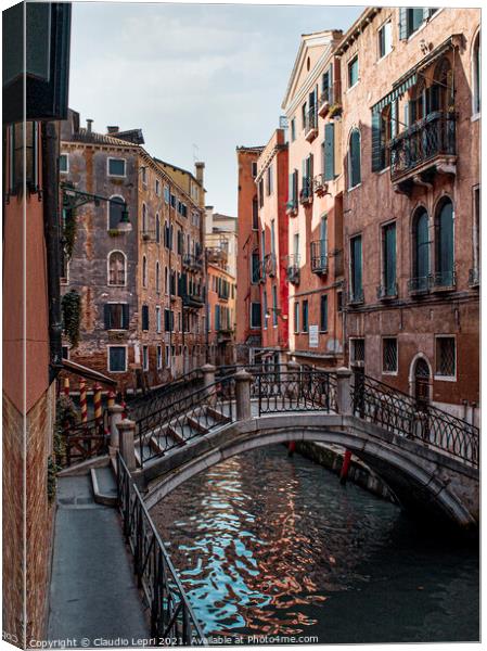 Small canal in Venice Canvas Print by Claudio Lepri