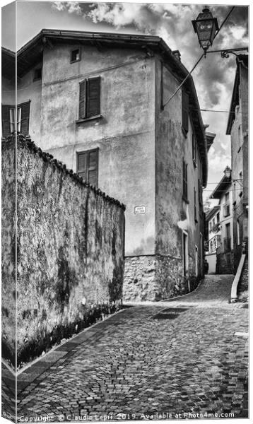 Crossing of alleys in alpine village, BW Canvas Print by Claudio Lepri