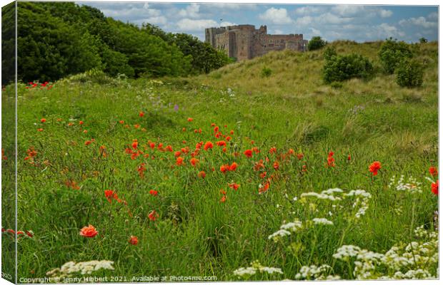 Bamburgh Castle in Northumberland Canvas Print by Jenny Hibbert