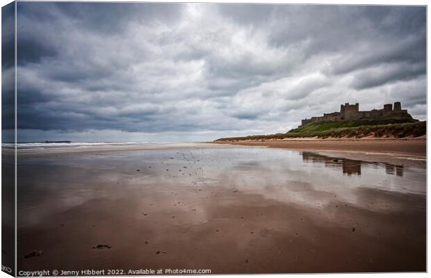 Bamburgh Castle taken from the beach on a stormy day Canvas Print by Jenny Hibbert