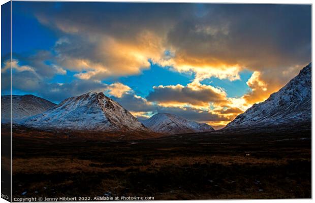 Sunsetting over the mountains in Glencoe Highlands of Scotland Canvas Print by Jenny Hibbert