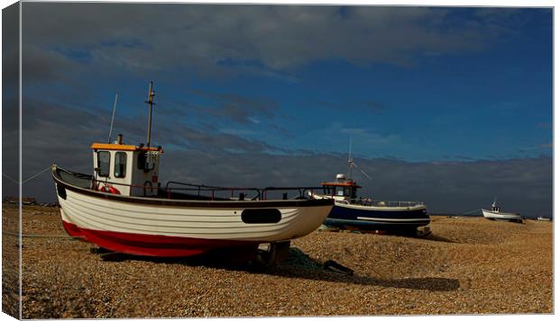 Boats moored on Dungeness beach Canvas Print by Jenny Hibbert