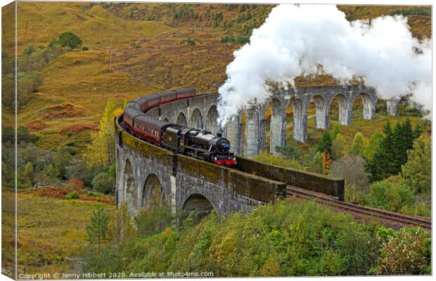 Steam train crossing Glenfinnan Viaduct Canvas Print by Jenny Hibbert