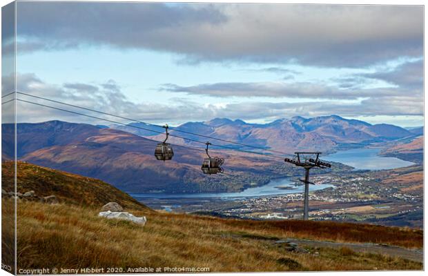 Cable pods with mountain bikes heading up to Aonach Mor Canvas Print by Jenny Hibbert