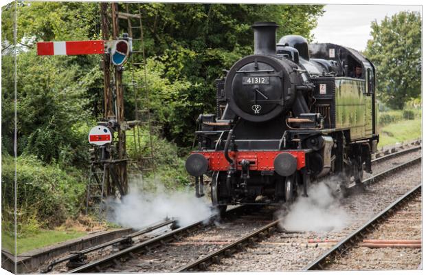 Steam train locomotive travelling Canvas Print by Brigitte Whiteing