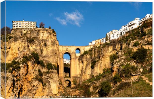 Ronda and the Puente Nuevo over El Tajo Gorge  Canvas Print by DiFigiano Photography