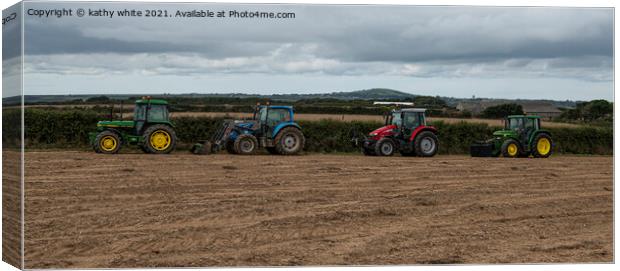 Tractors  in a Cornish field Canvas Print by kathy white