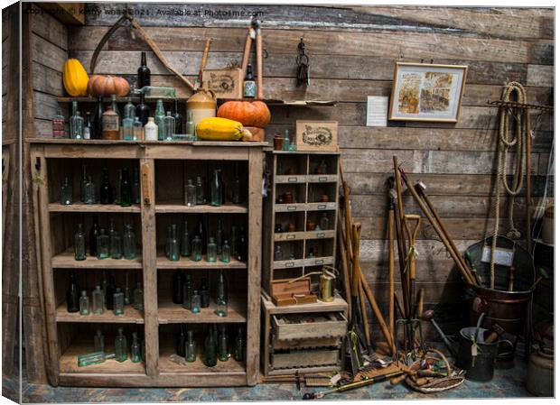 old bottles, garden shed,garden tools Canvas Print by kathy white