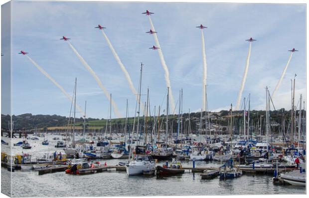 Red arrows in a Falmouth cornish sky,smoke trails, Canvas Print by kathy white