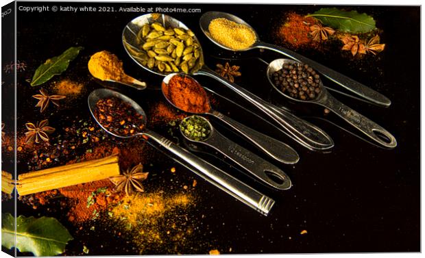 curry spice on a black background Canvas Print by kathy white