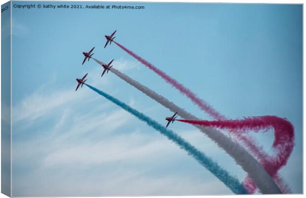 Red arrows in a cornish sky,smoke trails, red,whit Canvas Print by kathy white