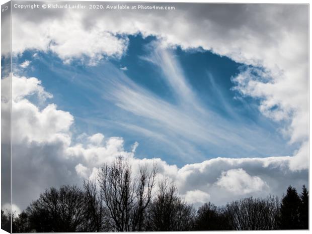 A 'Hole' lot of Cirrus Canvas Print by Richard Laidler