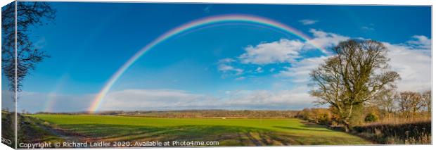 Double Rainbow at Thorpe Panorama Canvas Print by Richard Laidler
