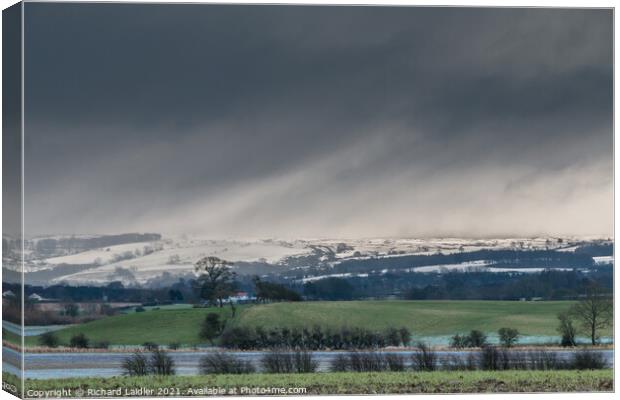 Bright Interval and Snow Squall over Newsham Moor Canvas Print by Richard Laidler