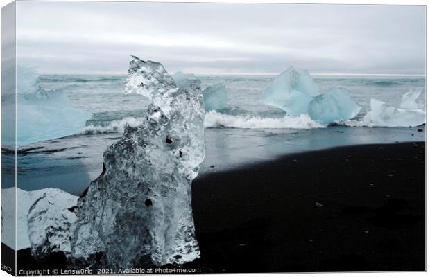 Blocks of glacial ice washed ashore in Iceland Canvas Print by Lensw0rld 