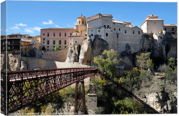 Footbridge and beautiful buildings in Cuenca, Spain, on a sunny day Canvas Print by Lensw0rld 