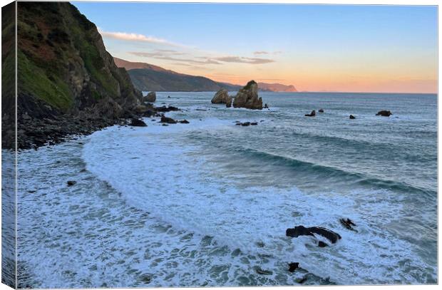 Oceanfront at San Juan de Gaztelugatxe in Spain Canvas Print by Lensw0rld 