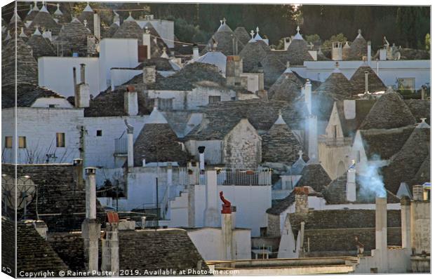 View over the famous "Trulli" of Alberobello Canvas Print by Lensw0rld 