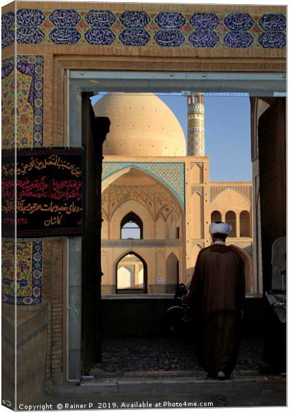 A man enters Agha Bozorg mosque Canvas Print by Lensw0rld 
