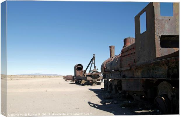 Train cemetery in Uyuni, Bolivia Canvas Print by Lensw0rld 