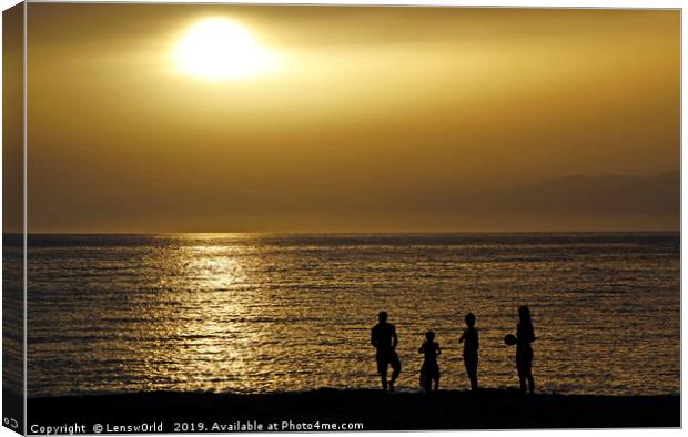 Silhouettes of a family at the beach in Crete duri Canvas Print by Lensw0rld 