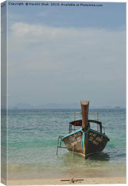 Traditional Thai Longtail Boat on a Beach Canvas Print by Harshil Shah