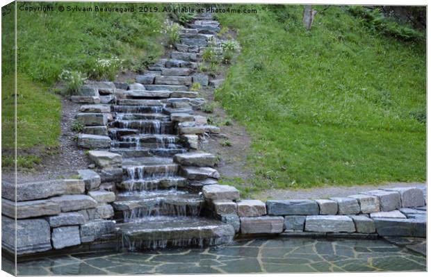 Rock water cascade Canvas Print by Sylvain Beauregard