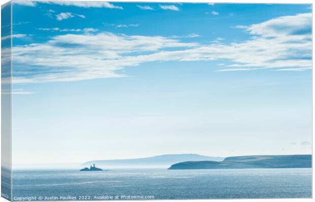 Blue skies over Godrevy Lighthouse, Cornwall Canvas Print by Justin Foulkes